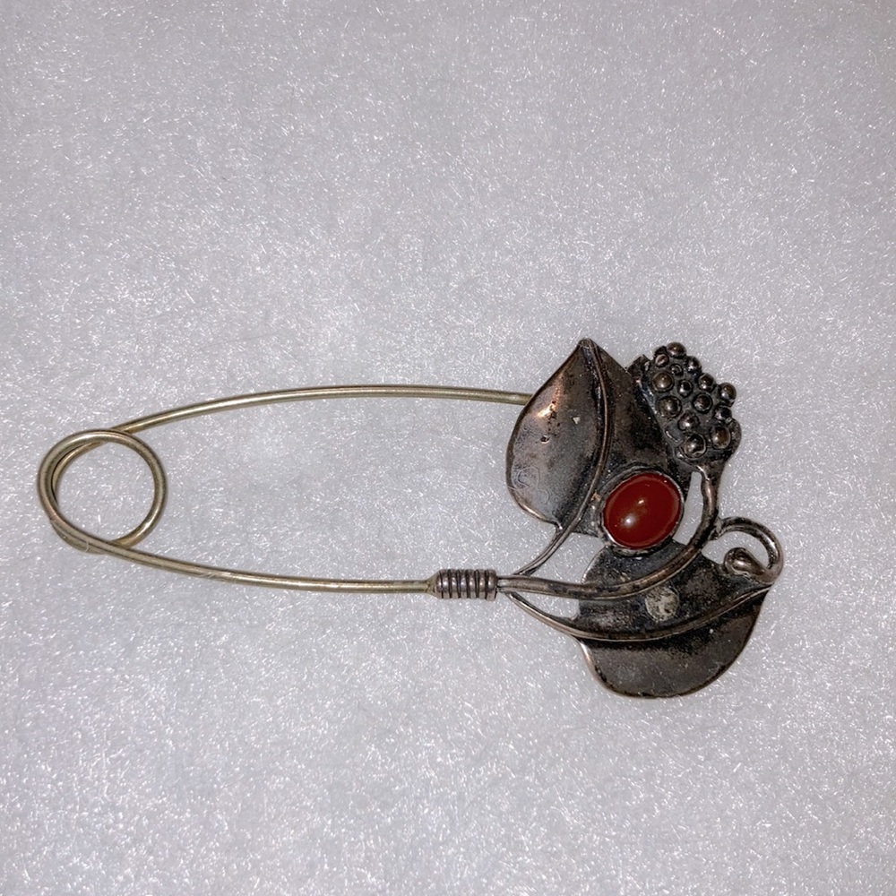 Hand tooled vintage artisan silver brooch
